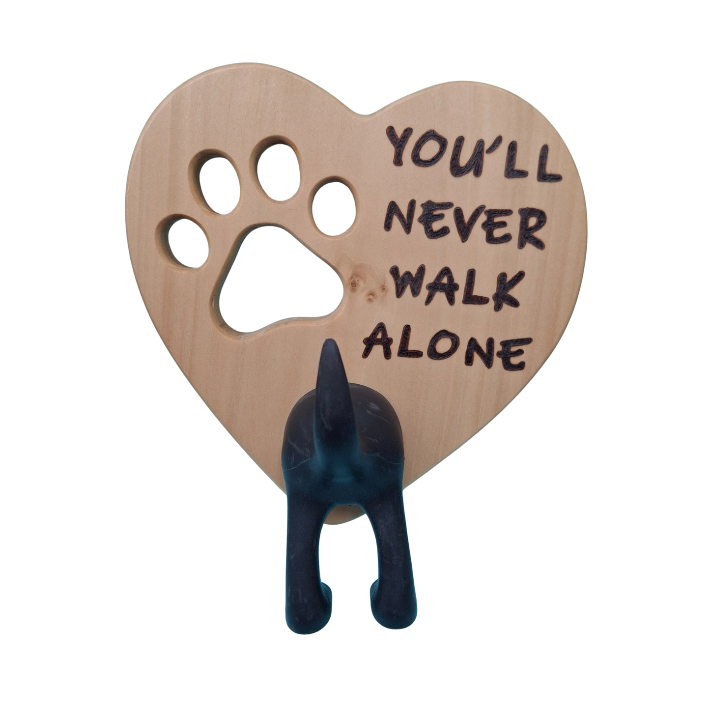 Heart-shaped wooden dog lead hanger with paw print cutout and 'You'll Never Walk Alone' text, featuring a black dog silhouette hook