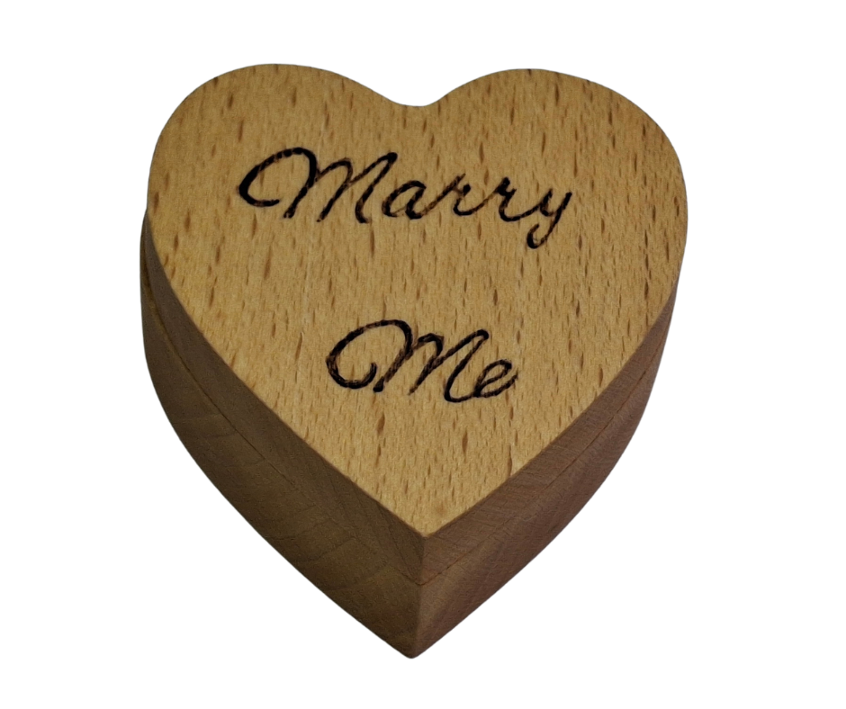 Hand-burnt heart-shaped ring box featuring "Marry Me" on its swivel lid, perfect for proposals