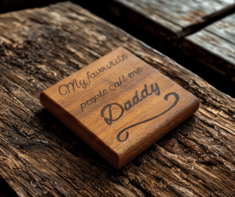 Sapele coaster with chamfered edges inscription "My favourite people call me Daddy" burnt in