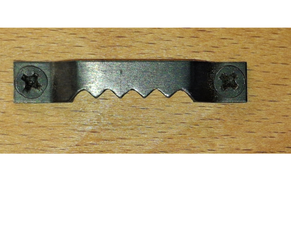 Example saw hook on the rear of the plaque for hanging