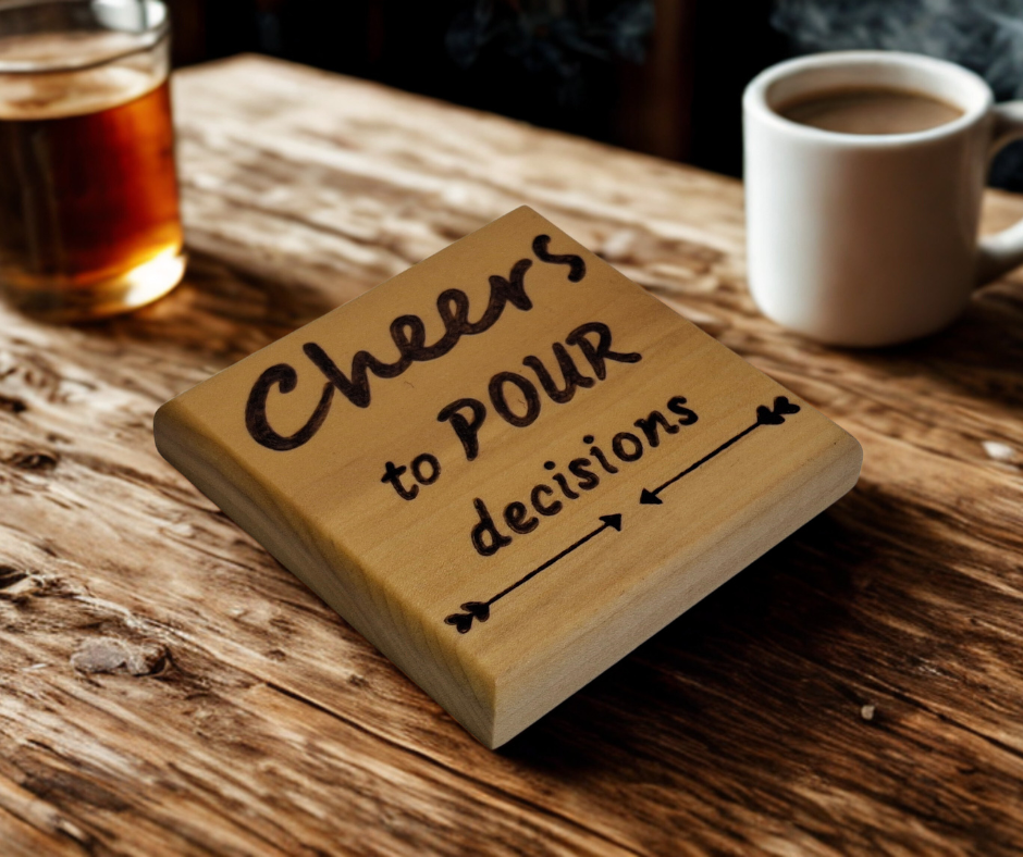 Tulipwood coaster with chamfered edges inscription "Cheers to POUR decisions" burnt in