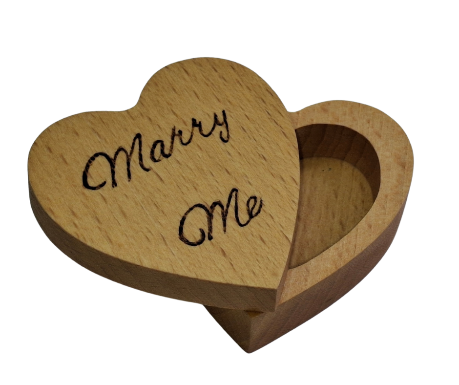 Hand-burnt heart-shaped ring box featuring "Marry Me" on its swivel lid, perfect for proposals
