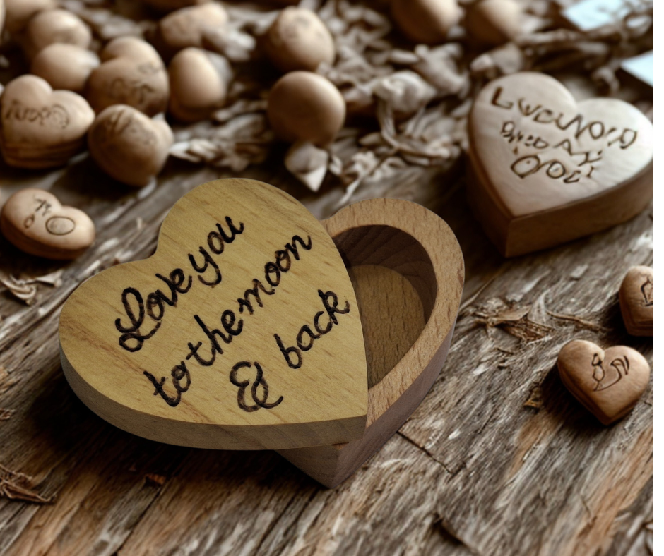 Small, heart-shaped wooden ring box with a swivel lid, hand-decorated with "Love You to the Moon and Back" pyrography