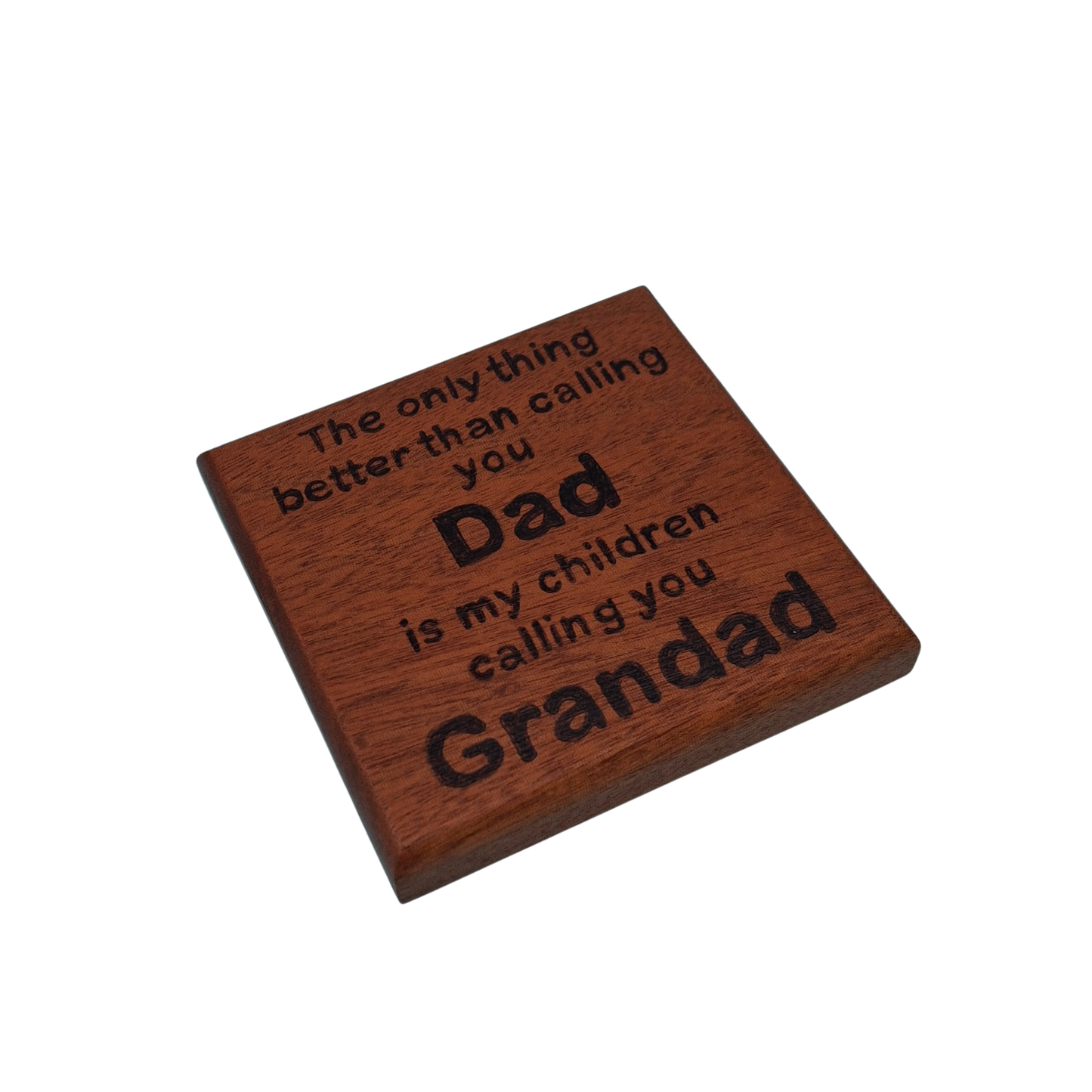 Dark wooden coaster with pyrography text reading 'The only thing better than calling you Dad is my children calling you Grandad'