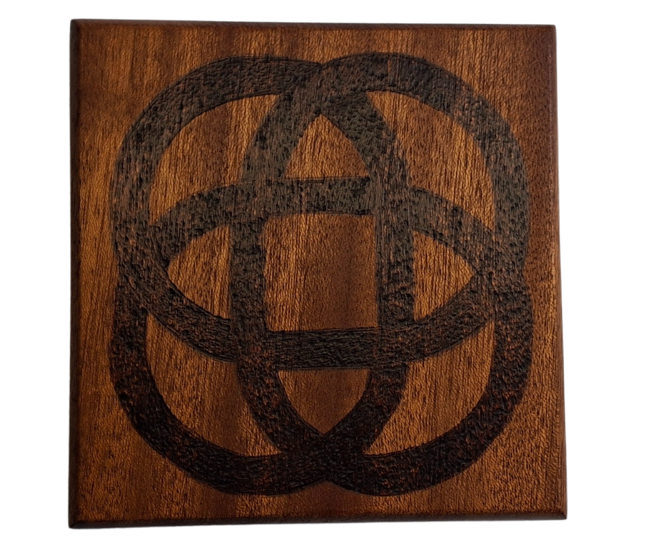Sapele coaster with chamfered edges with celtic design