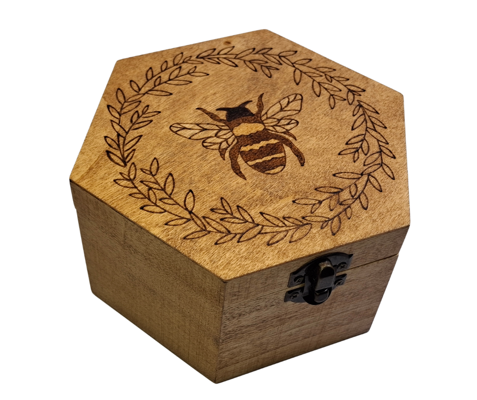 Box with a large bee inside a wreath burnt into the lid of the box