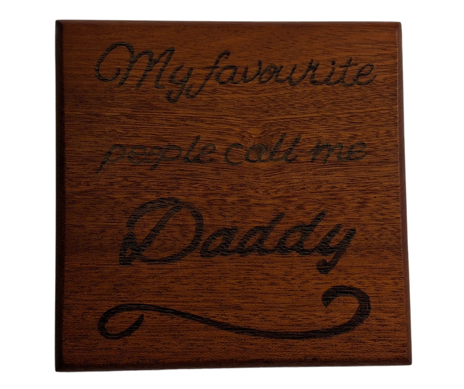Sapele coaster with chamfered edges inscription "My favourite people call me Daddy" burnt in