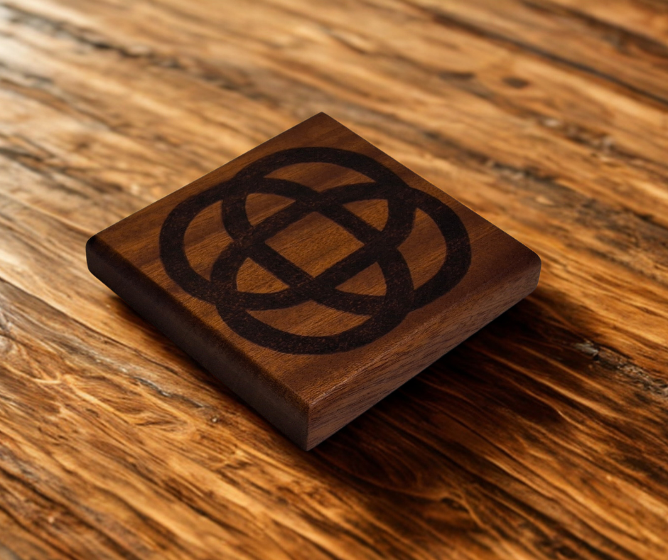 Sapele coaster with chamfered edges with a 4 point celtic round edge design burnt in