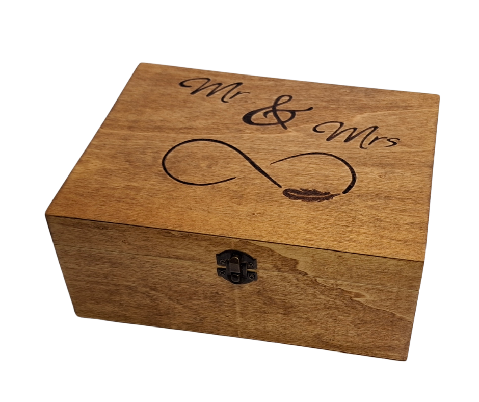 "Mr and Mrs" hand-burnt onto a wooden box top, featuring an infinity symbol and a delicate feather