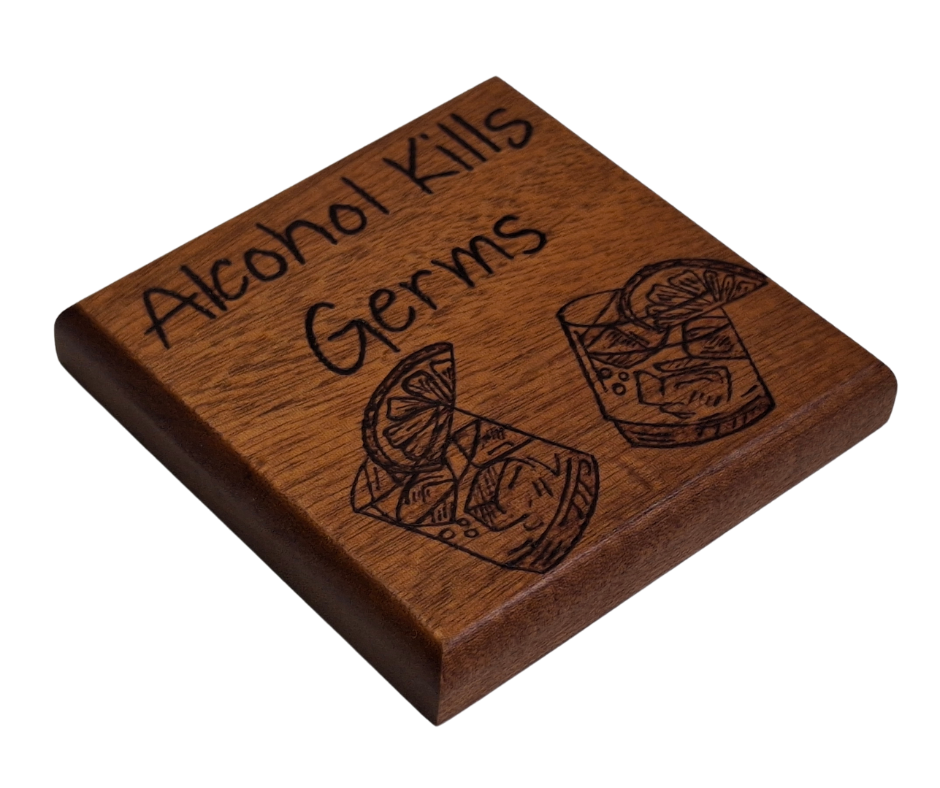 Sapele coaster with chamfered edges inscription "Alcohol Kills Germs" and a picture of 2 small glasses with lemon slices burnt in