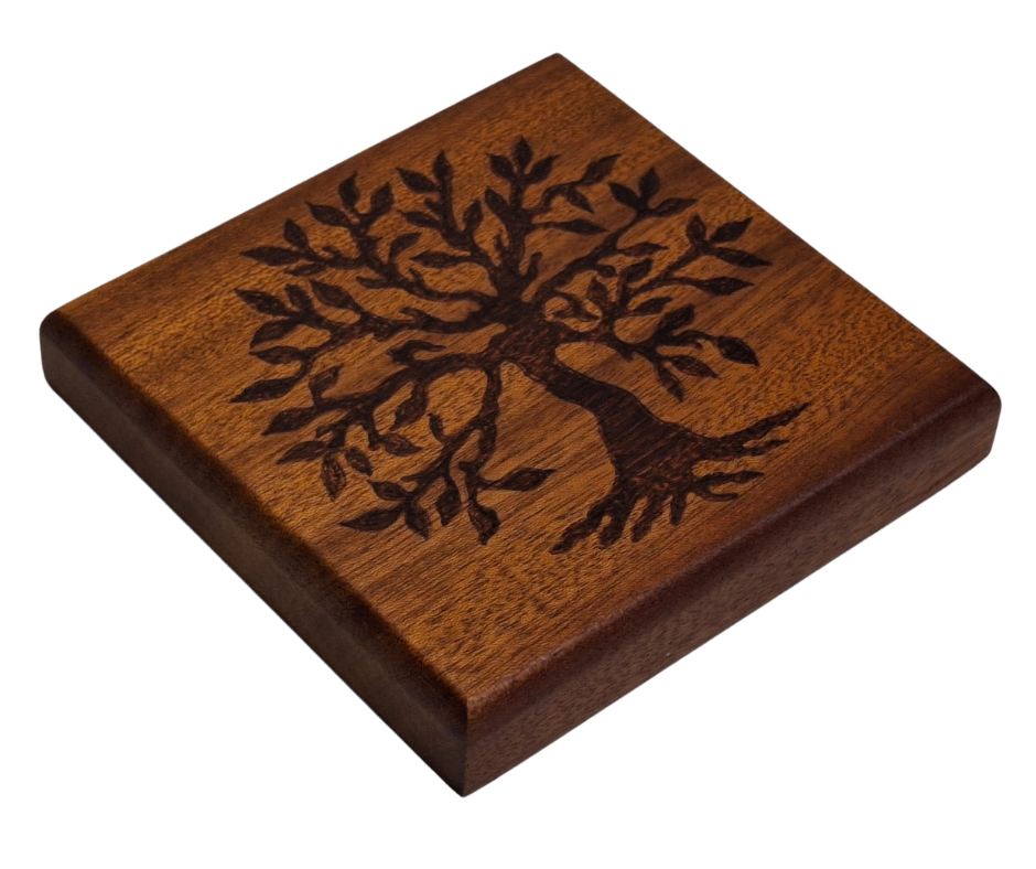 Sapele coaster with chamfered edges with a tree showing its roots burnt in
