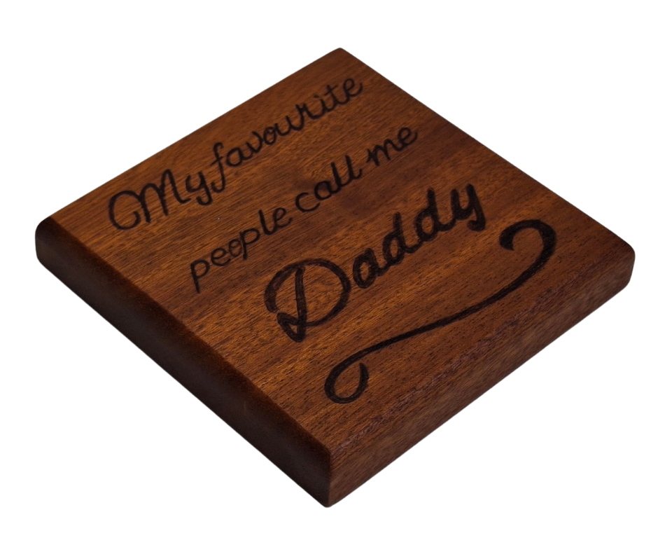 Sapele coaster with chamfered edges inscription "My favourite people call me Daddy" burnt in