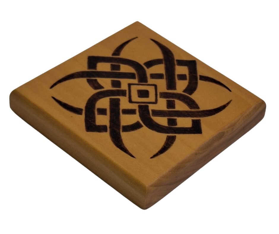Tulipwood coaster with chamfered edges with a 4 point celtic star design burnt in