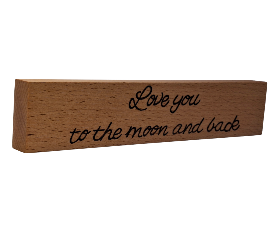 Hand-burnt freestanding desk sign featuring the heartfelt "Love You to the Moon and Back" message.