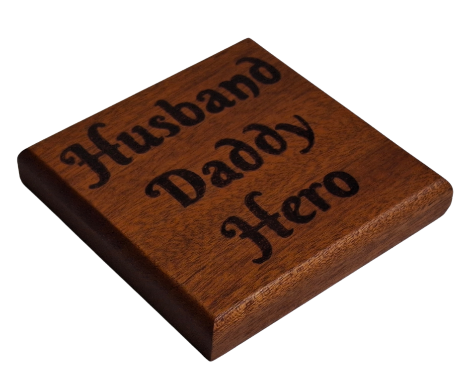 Sapele coaster with chamfered edges inscription "Husband Daddy Hero" burnt in