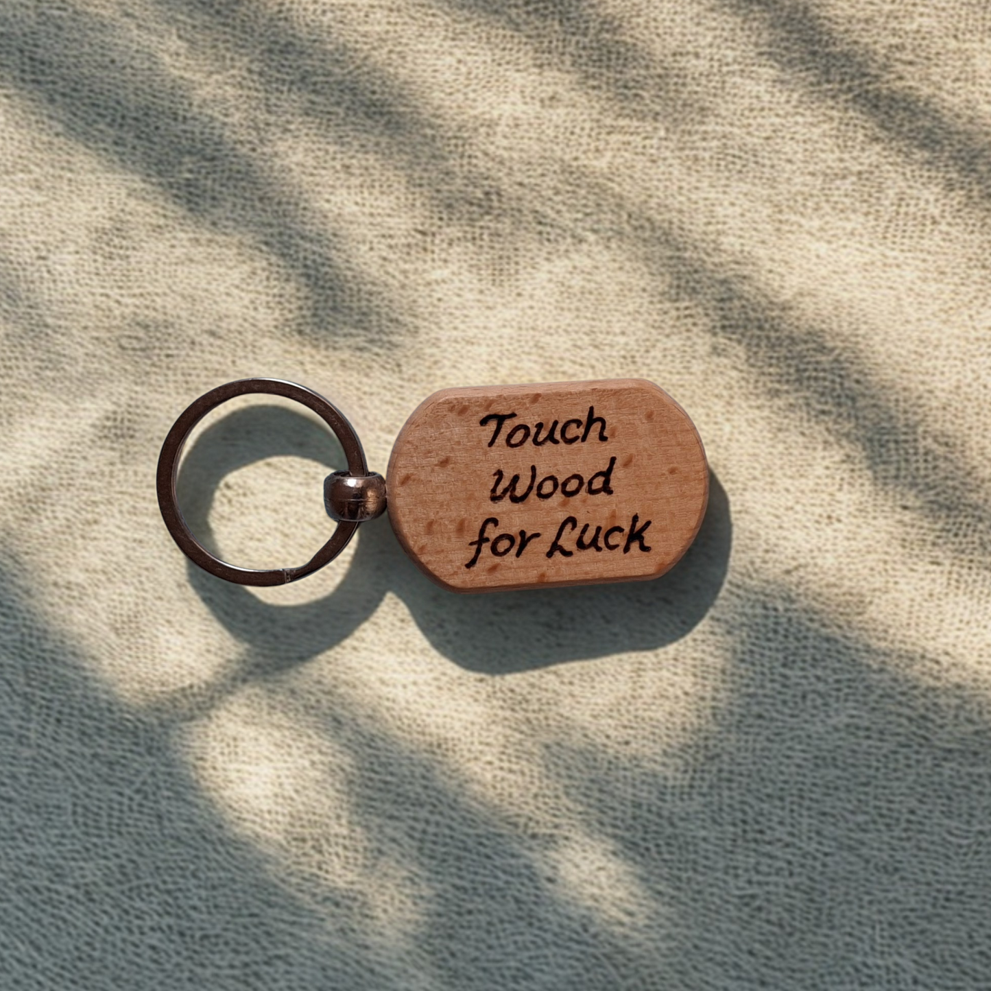 Oval beechwood keyring with 'Touch Wood for Luck' pyrography text and chrome split ring