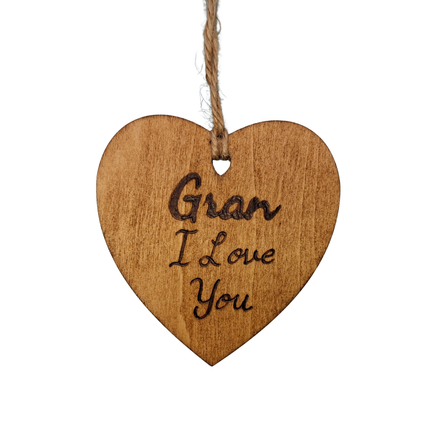 Heart-shaped wooden ornament, hand-drawn with pyrography, featuring the engraved phrase "Gran I Love You" in a decorative script.
