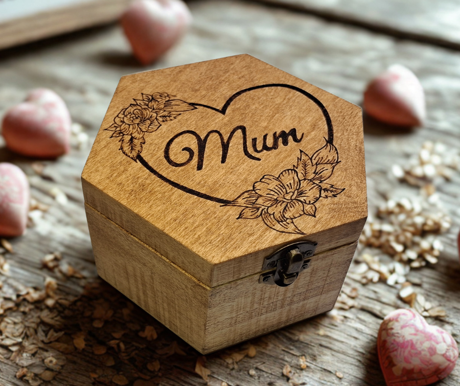 Box with "Mum" in a heart shaped frame with flowers burnt into the top of the box