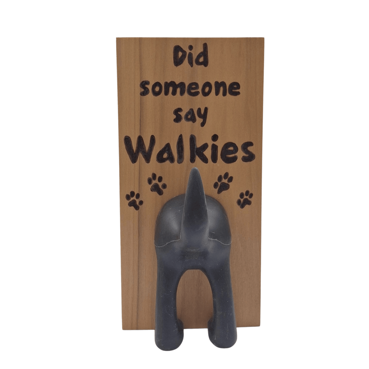 Wooden wall hook featuring the excited phrase "Did someone say Walkies" created with pyrography (hand burnt lettering and paw prints). A black dog's hindquarters and tail are attached to the bottom to form the hook.