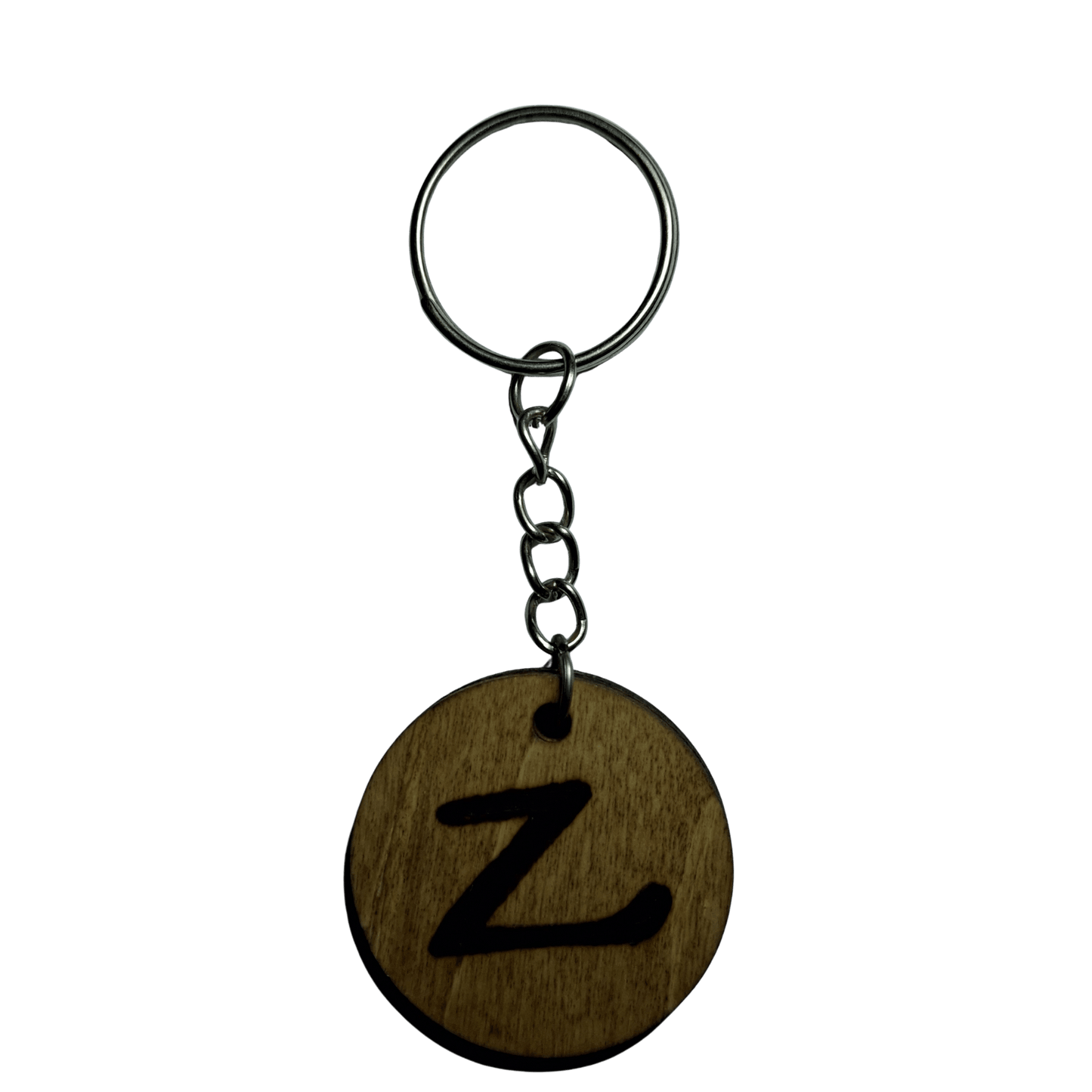 Round keyring made from veneered plywood. The letter Z is hand-burnt using pyrography, finished with a hardwax oil, and attached to a silver keychain.