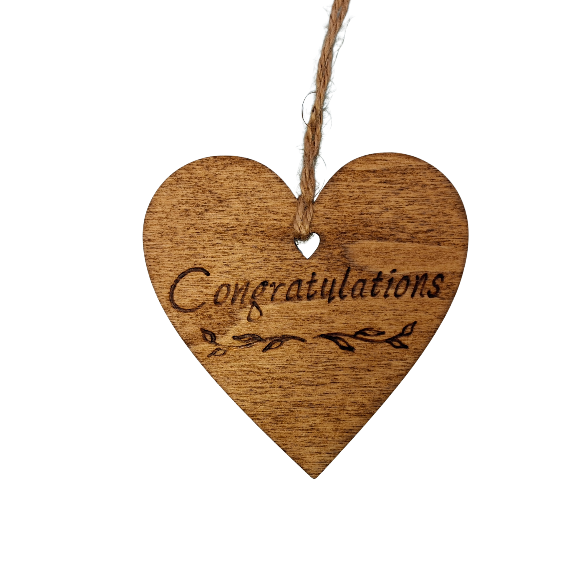 
Heart-shaped wooden ornament, hand-drawn with pyrography, featuring the engraved word "Congratulations" with decorative flourishes.