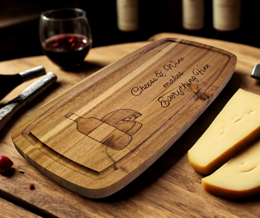 A multicolored, hand-decorated pyrography chopping board with the words "Cheese and Wine Makes Everything Fine," illustrated with a bottle of wine and a partial wheel of cheese
