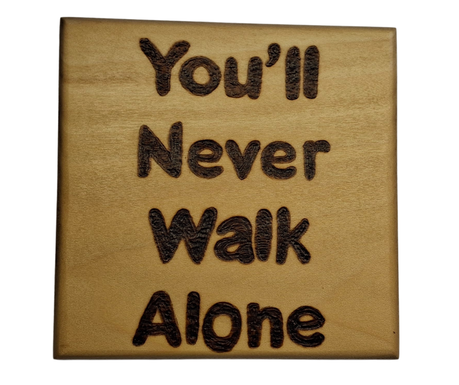 Tulipwood coaster with chamfered edges inscription "You'll never walk alone"  burnt onto the wood