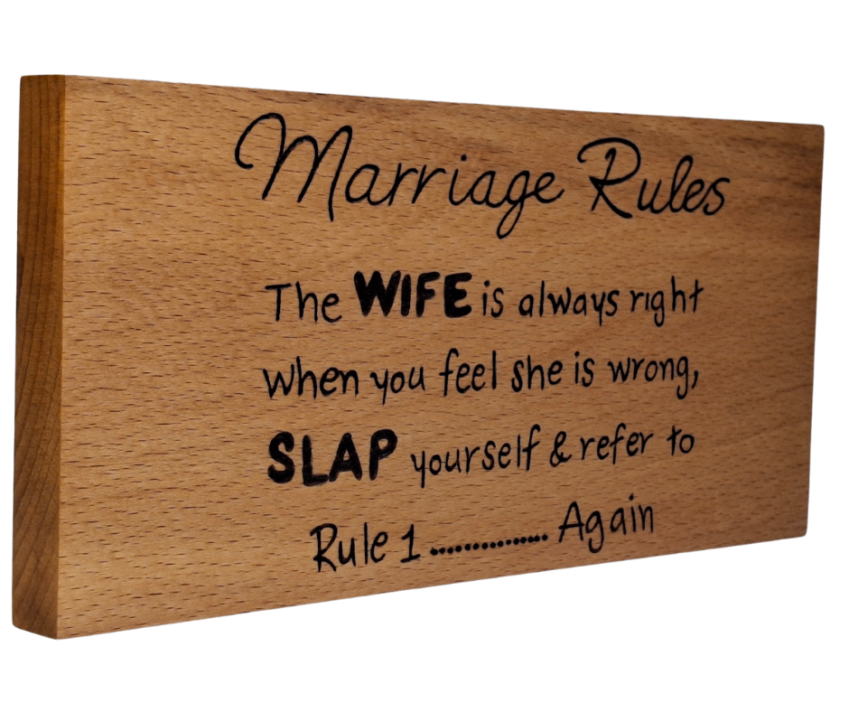 Wooden plaque hand-decorated with "Marriage Rules: The wife is always right, and if you think she's wrong, slap yourself and refer to rule 1."