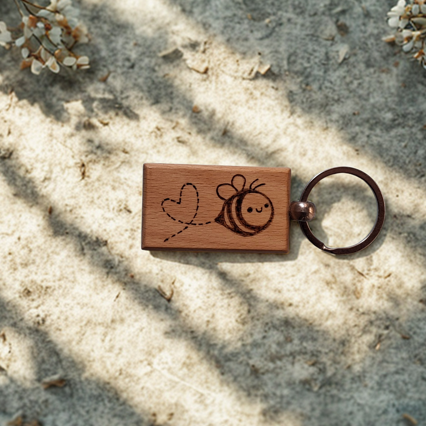 Rectangle beechwood keyring with cute bee and heart trail pyrography design and chrome split ring"