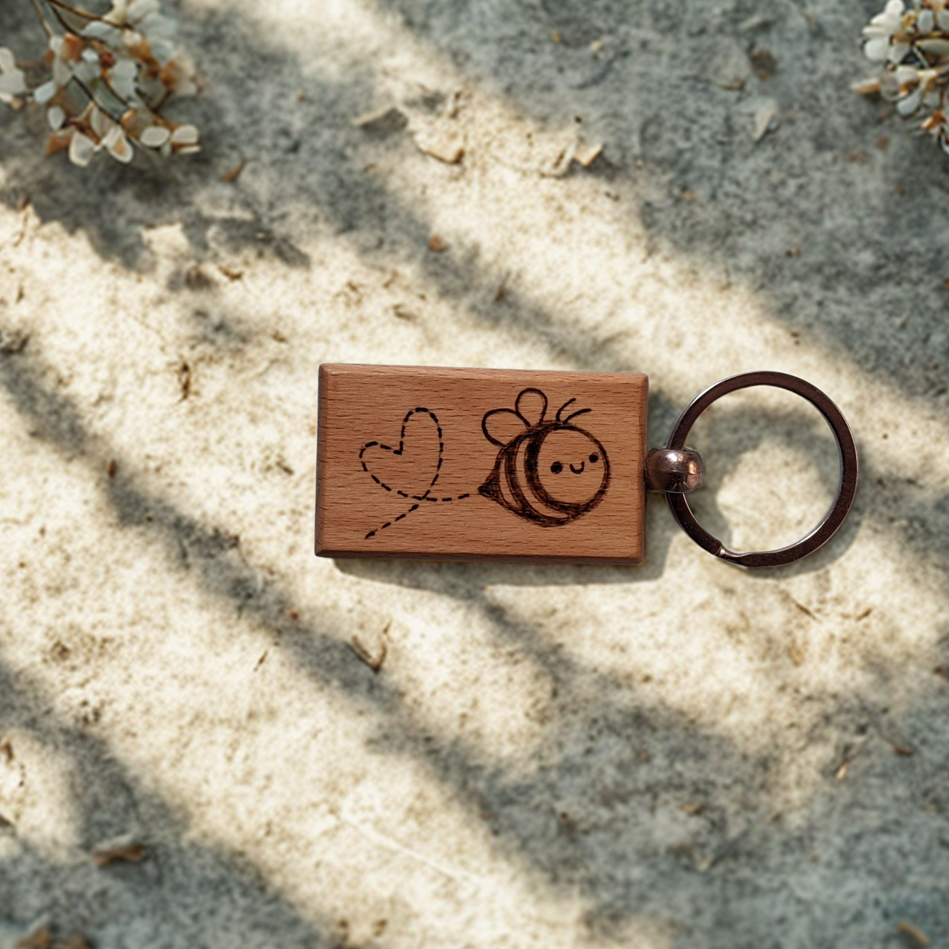 Rectangle beechwood keyring with cute bee and heart trail pyrography design and chrome split ring"