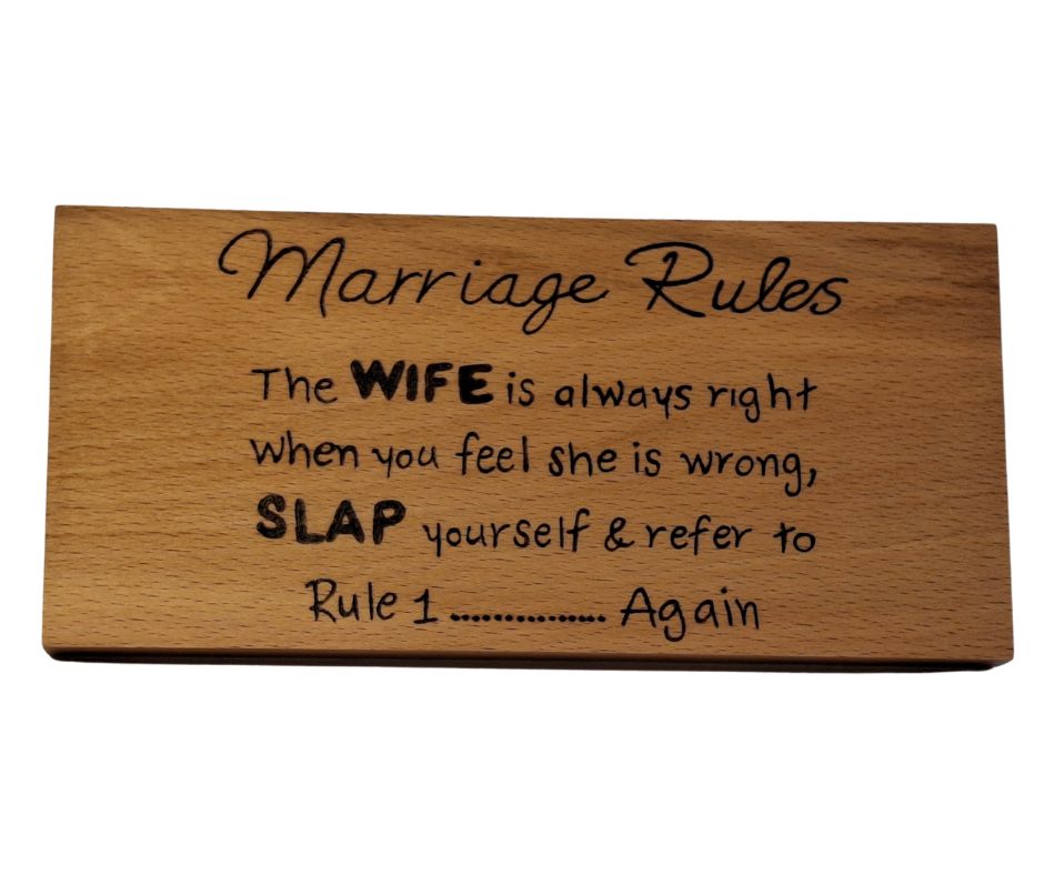Wooden plaque hand-decorated with "Marriage Rules: The wife is always right, and if you think she's wrong, slap yourself and refer to rule 1."
