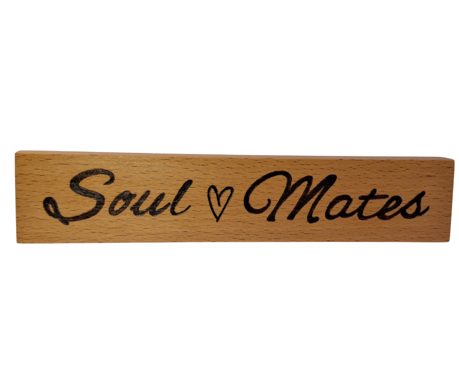 Decorative wooden desktop sign, intricately hand-decorated with the romantic phrase "Soul Mates," visually connected by a small heart.