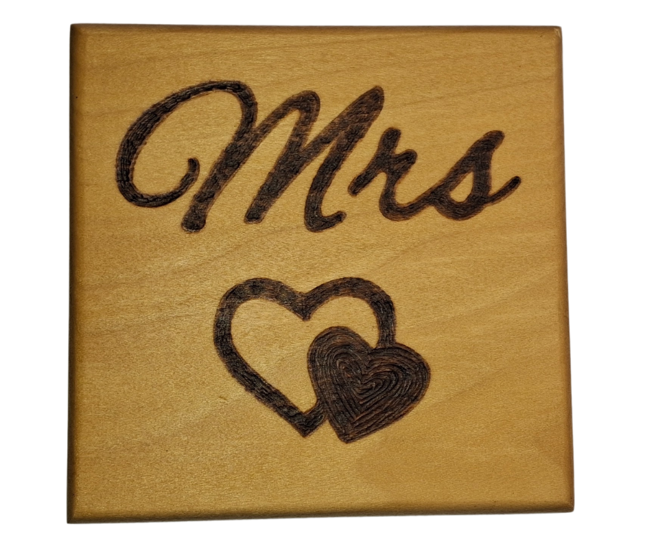 Tulipwood coaster with chamfered edges inscription "Mrs" with a decorative double heart on the bottom burnt in