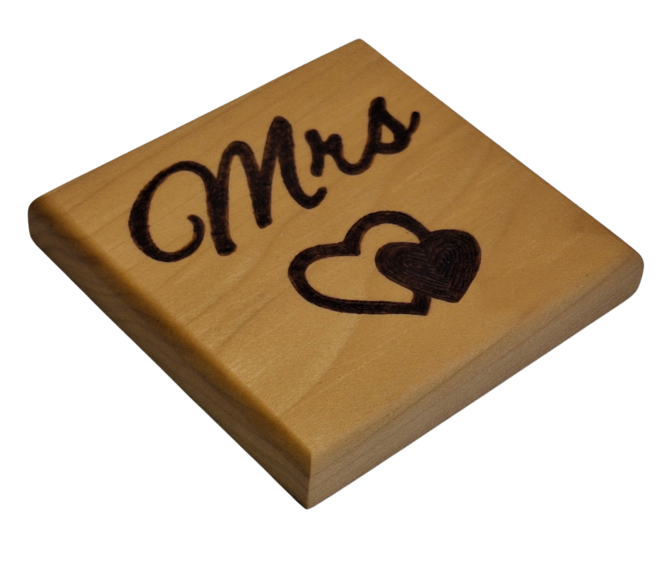 Tulipwood coaster with chamfered edges inscription "Mrs" with a decorative double heart on the bottom burnt in