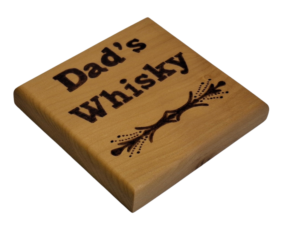 Tulipwood coaster with chamfered edges inscription "Dad's Whisky" with a decorative border on the bottom burnt in