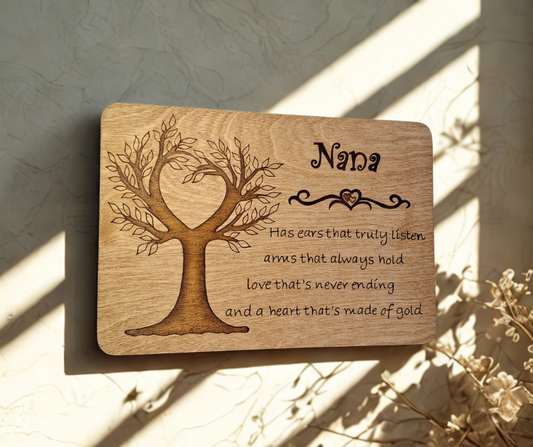 Decorative wooden sign for Nana, with a prominent tree illustration on the left, a detailed heart border, and the custom pyrography verse describing a loving Nana