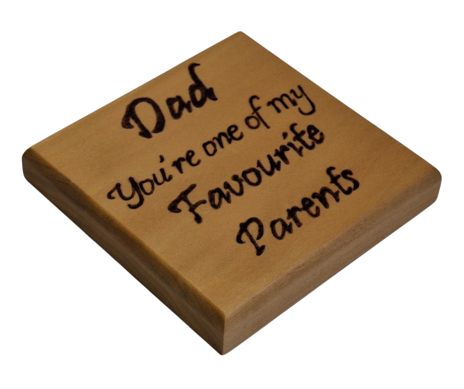 Tulipwood coaster with chamfered edges inscription "Dad's Whisky" with a decorative border on the bottom burnt in