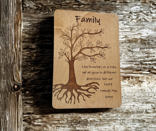 Decorative A4 wood-burnt plaque for wall display, showcasing a detailed tree graphic and the family-themed quote about roots and branches