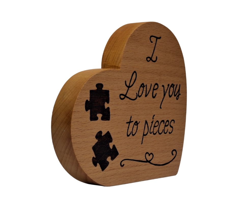 Hand-burnt freestanding heart plaque, featuring "I Love You to Pieces" text and a charming illustration of two jigsaw pieces pulling apart.