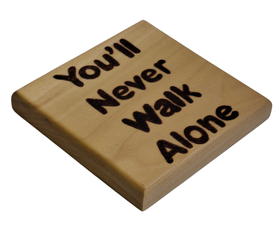 Tulipwood coaster with chamfered edges inscription "You'll never walk alone"  burnt onto the wood
