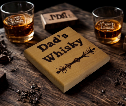Tulipwood coaster with chamfered edges inscription "Dad's Whisky" with a decorative border on the bottom burnt in