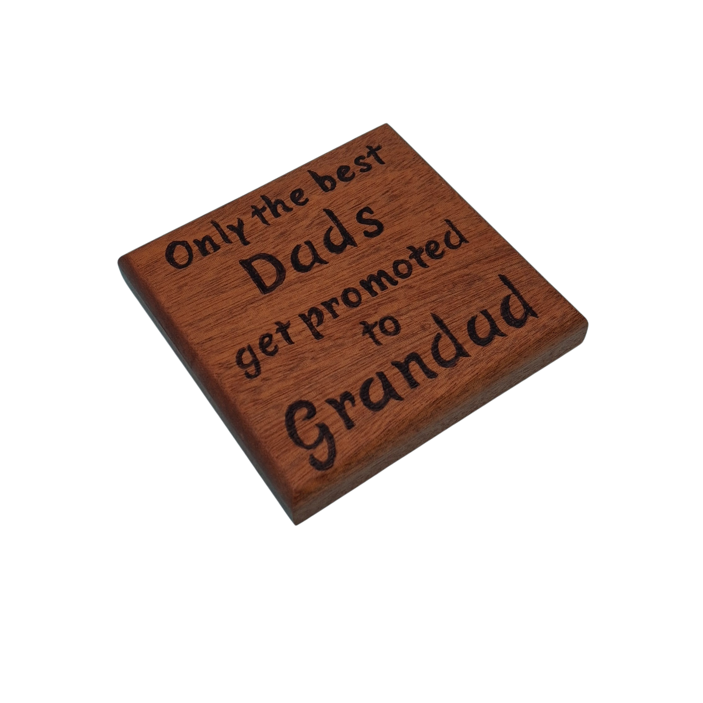 Dark wooden coaster with pyrography text reading 'Only the best Dads get promoted to Grandad'