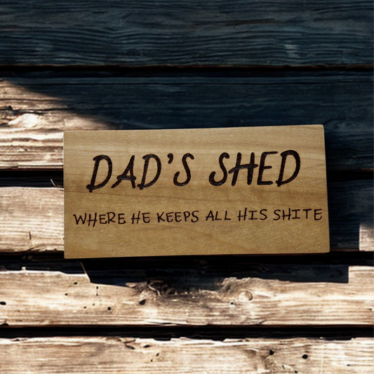 Hand decorated plaque wording Dad’s shed where he keeps all his shite