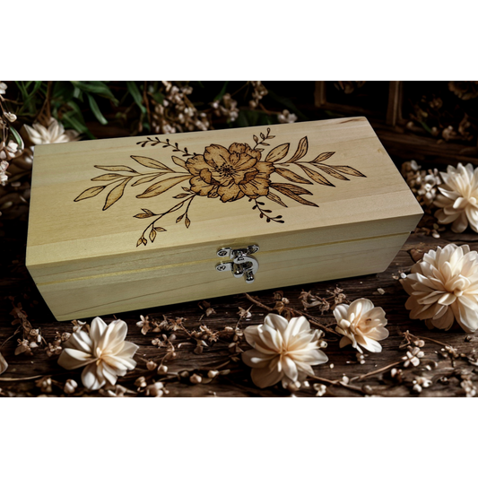 Light wood rectangular box featuring intricate pyrography floral patterns on its surface
