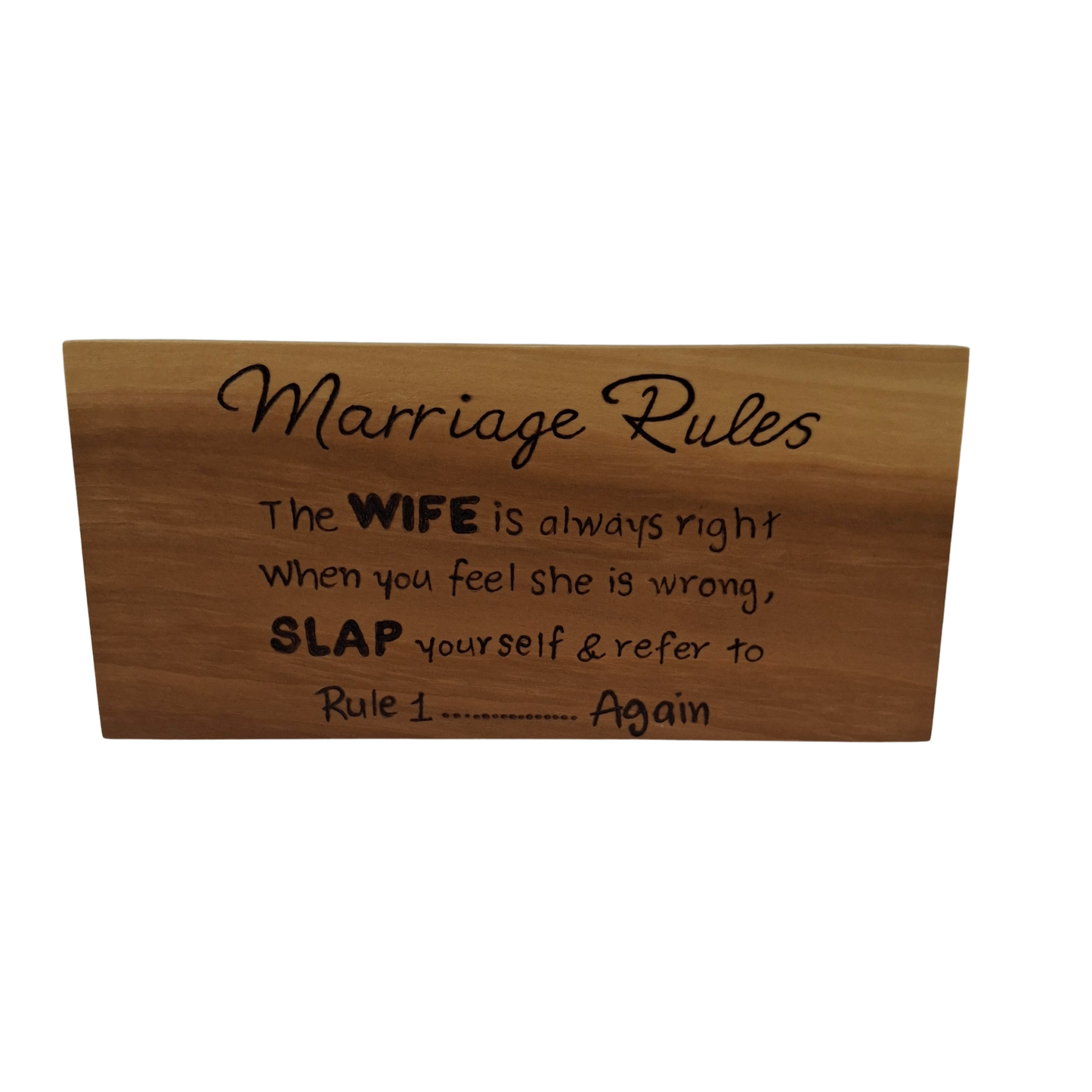 Wooden sign with humorous 'Marriage Rules' text on a white background