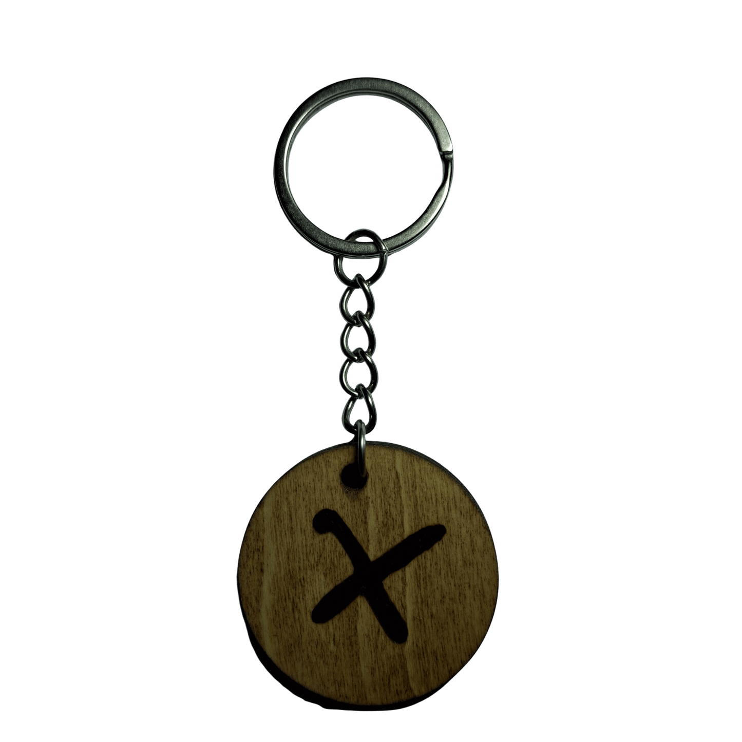 Round keyring made from veneered plywood. The letter X is hand-burnt using pyrography, finished with a hardwax oil, and attached to a silver keychain.