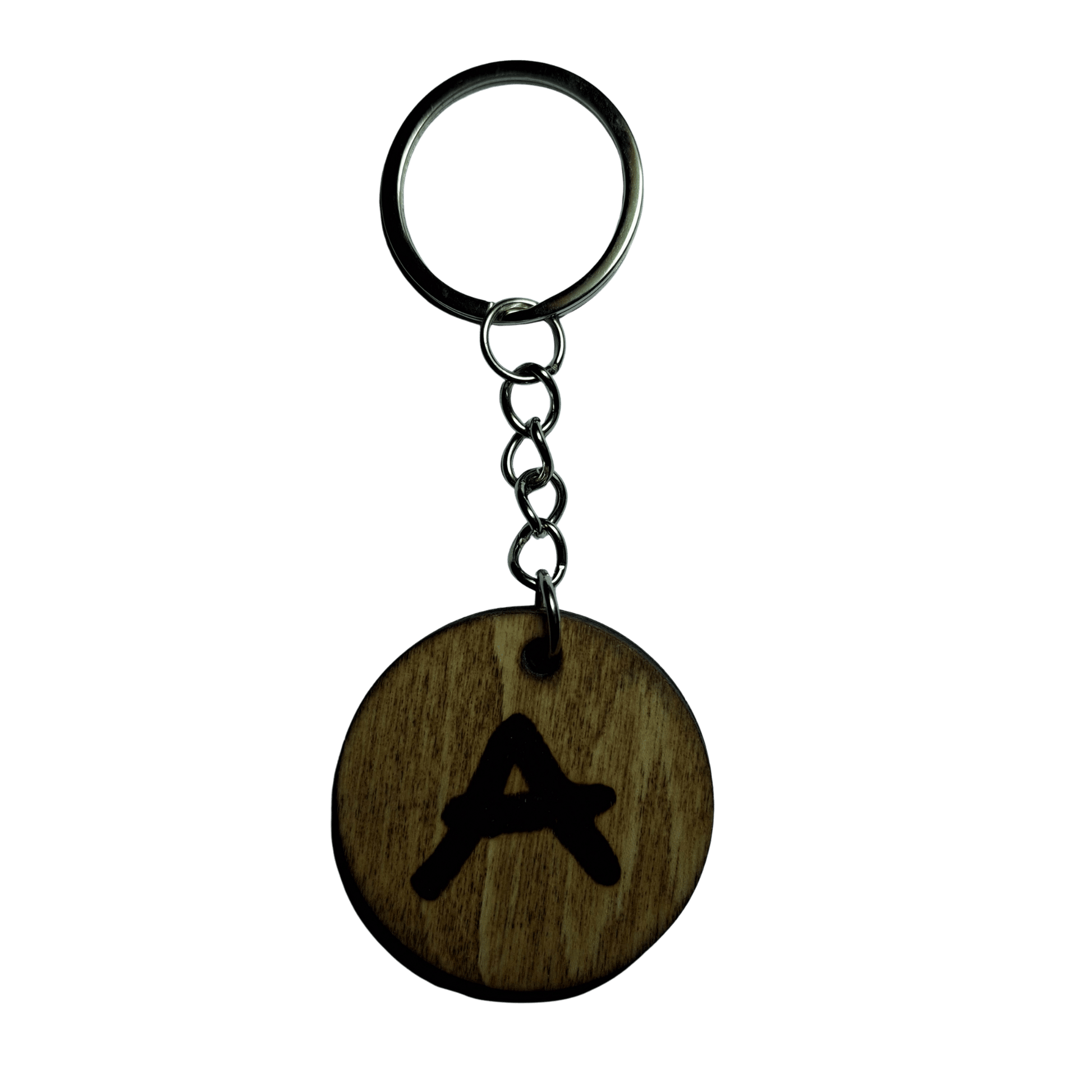 Round keyring made from veneered plywood. The letter is A hand-burnt using pyrography, finished with a hardwax oil, and attached to a silver keychain.