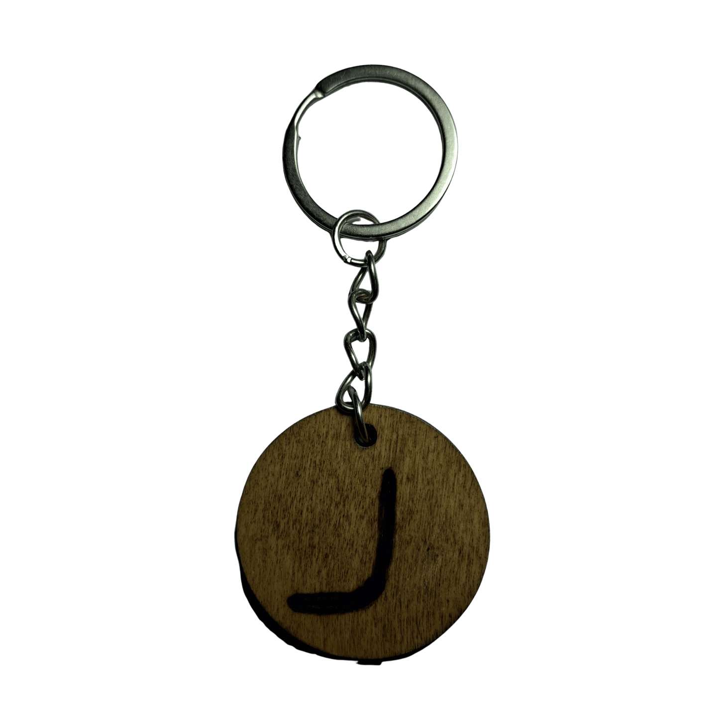 Round keyring made from veneered plywood. The letter J is hand-burnt using pyrography, finished with a hardwax oil, and attached to a silver keychain.