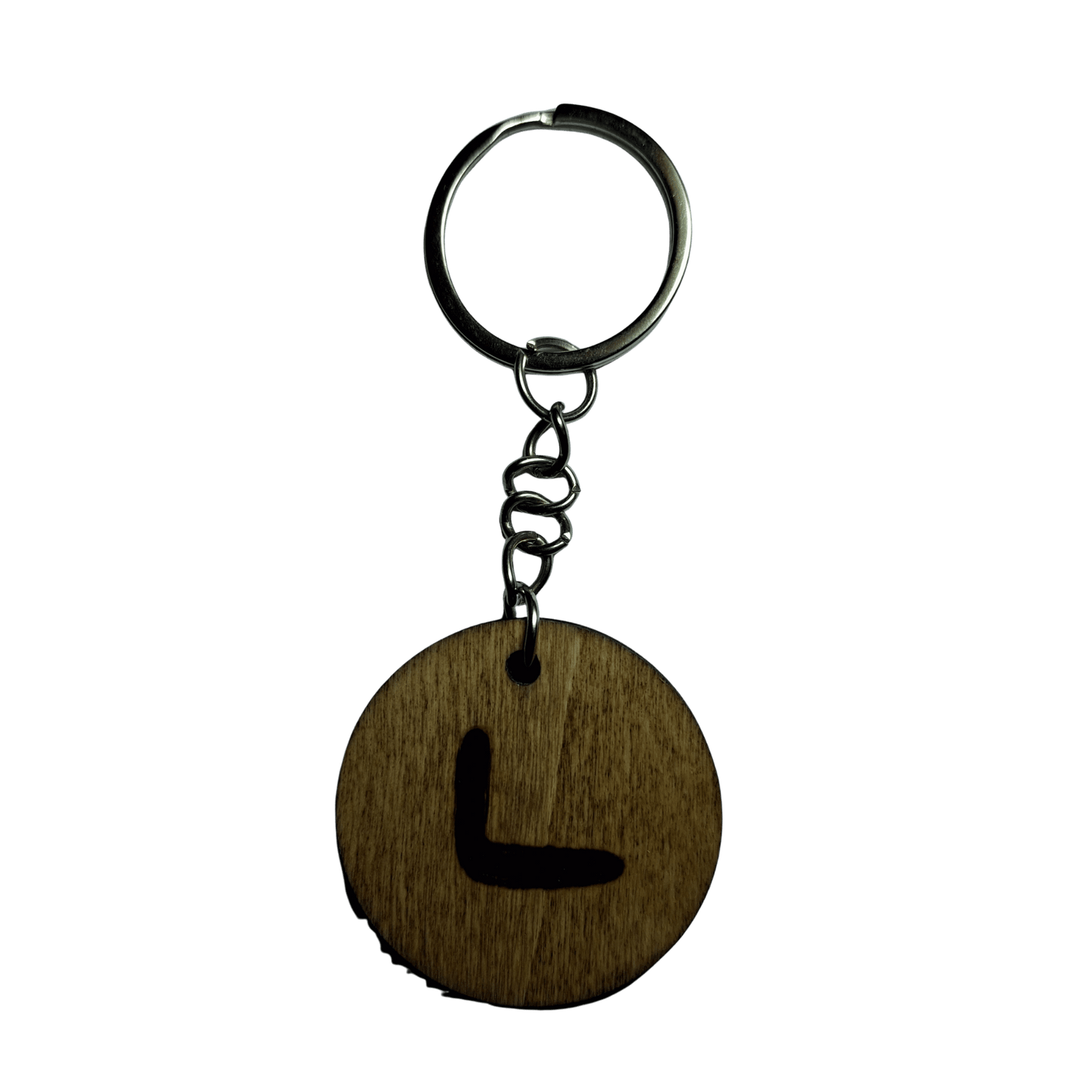 Round keyring made from veneered plywood. The letter L is hand-burnt using pyrography, finished with a hardwax oil, and attached to a silver keychain.