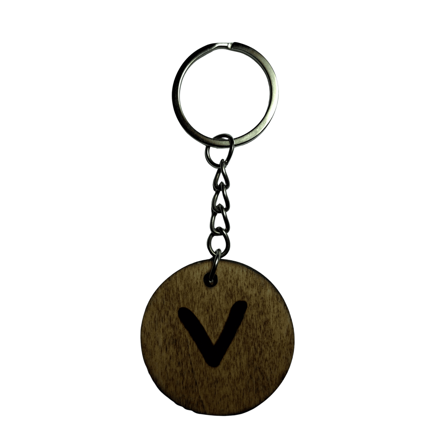 Round keyring made from veneered plywood. The letter V is hand-burnt using pyrography, finished with a hardwax oil, and attached to a silver keychain.